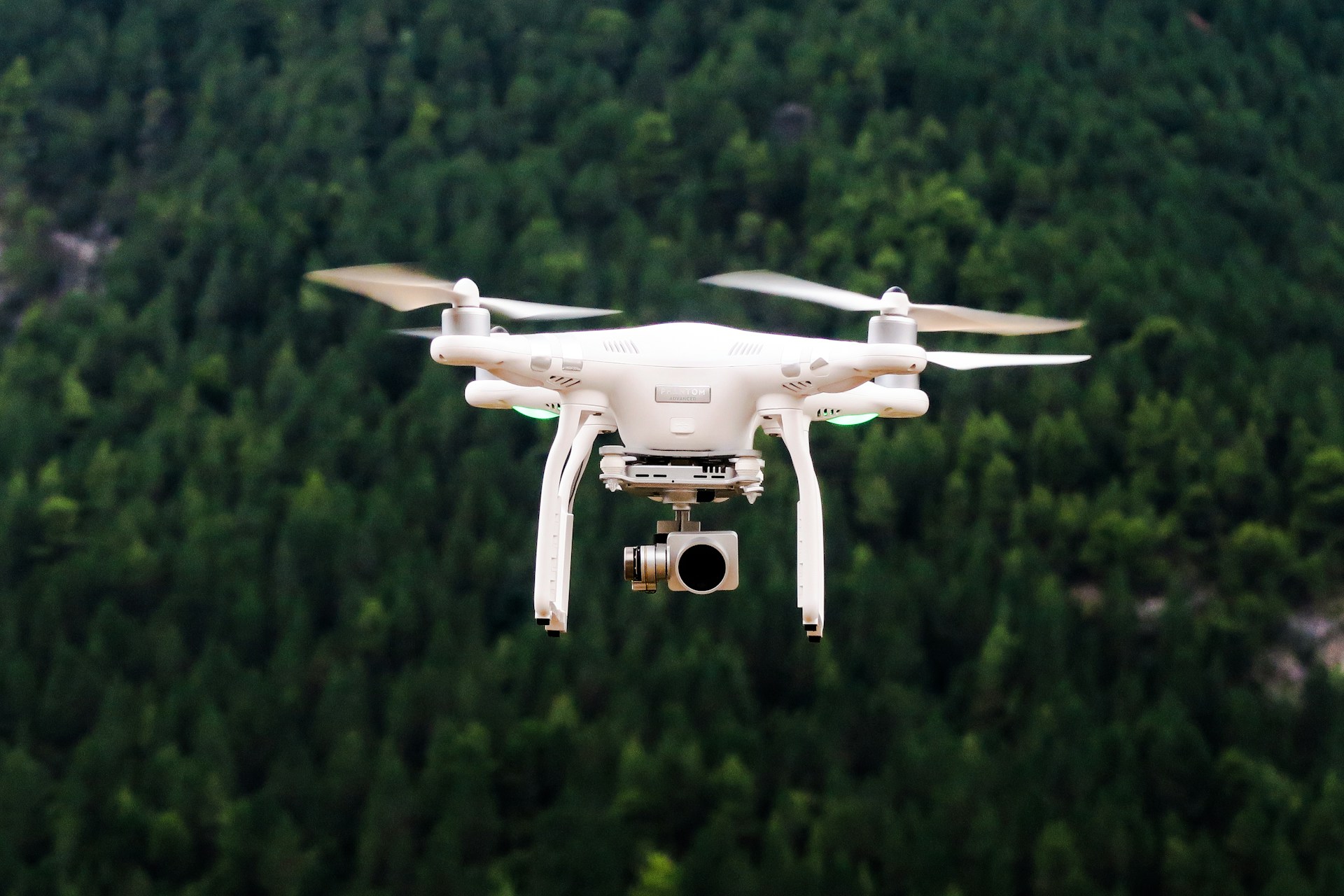 A drone flying with a camera attached